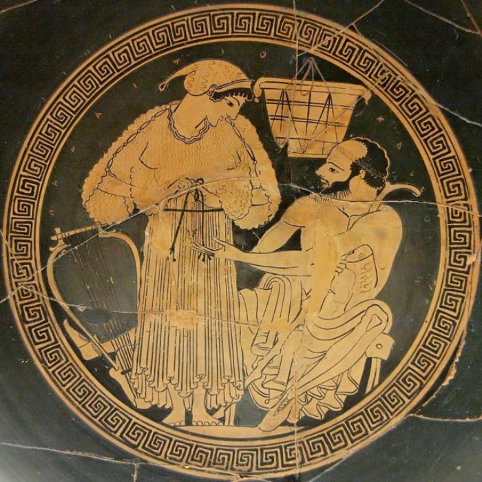 Музыкант на банкете одевается для клиента. Тондо работы Ефрония. Около 490 г. до н. э. Британский музей.